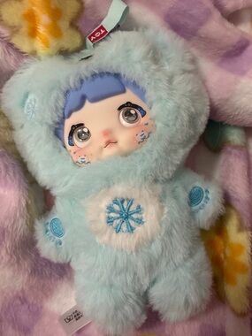 Nommi stuffed animal